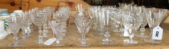Four Georgian glass rummers, five part suites of cut table glass and a bowl with coloured inclusions